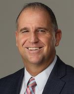 NorrisJeffery_180x230 Man smiling.
