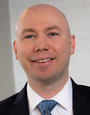 Adam Brown, Corporate Claims Administration Director