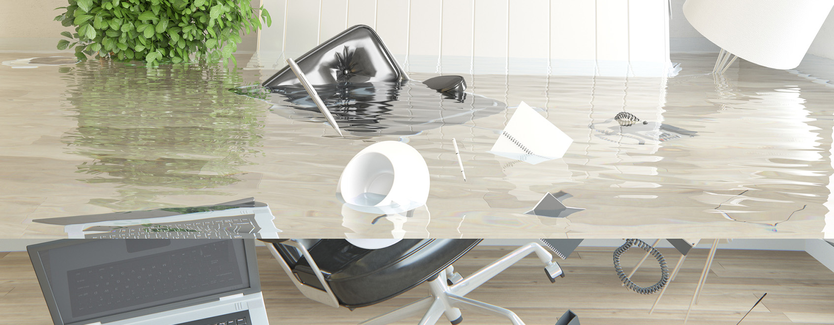 a flooded office, with furniture floating in the water