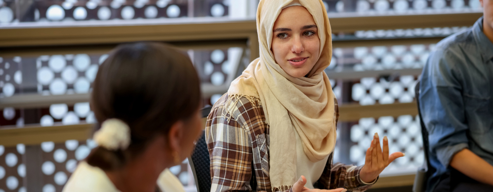 A female employee participates in a multicultural ERG group.